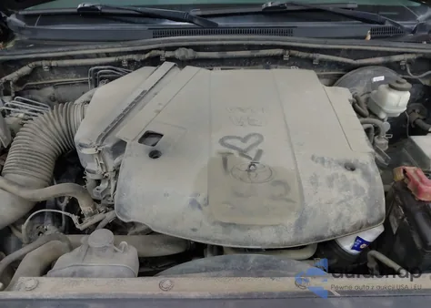 2015 Toyota Tacoma Base V6 z USA, uszkodzony, nr VIN 3TMLU4EN9FM206890